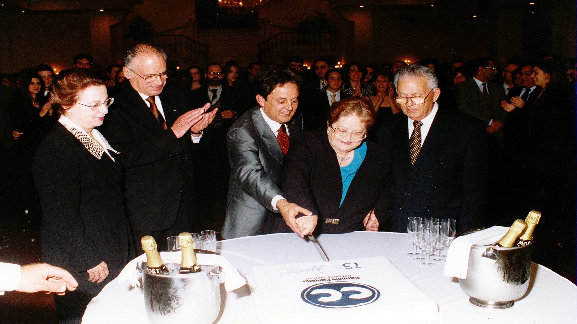 Carmelo Caruana Company Managing Director Beppe Hili and Rose and Joseph Hili with the Honourable President Ugo Mifsud Bonnici in 1998, celebrating the company's 75th Anniversary